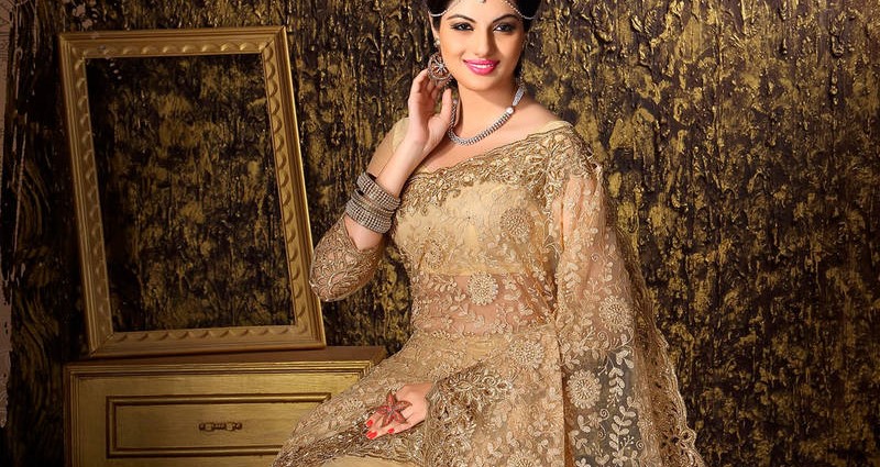golden embroidered net saree blouse design