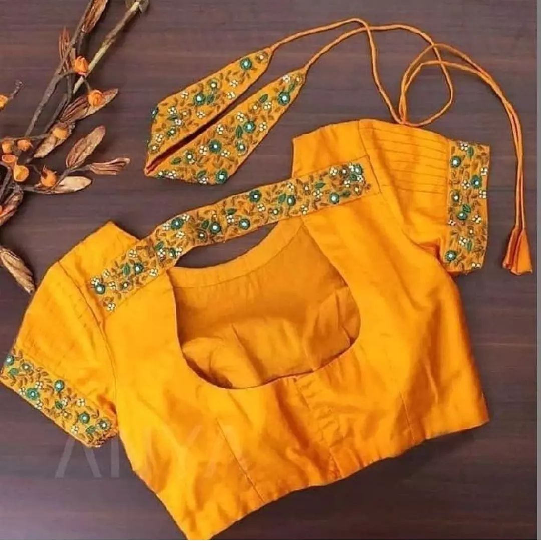 Yellow simple blouse neck design 2023