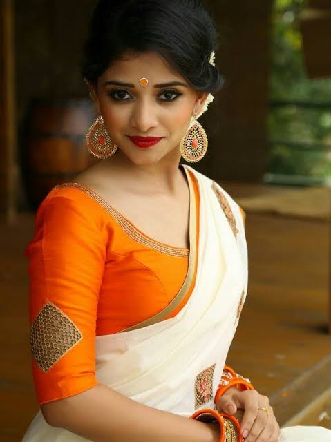 Orange Trendy Kerala Saree Blouse Neck Designs