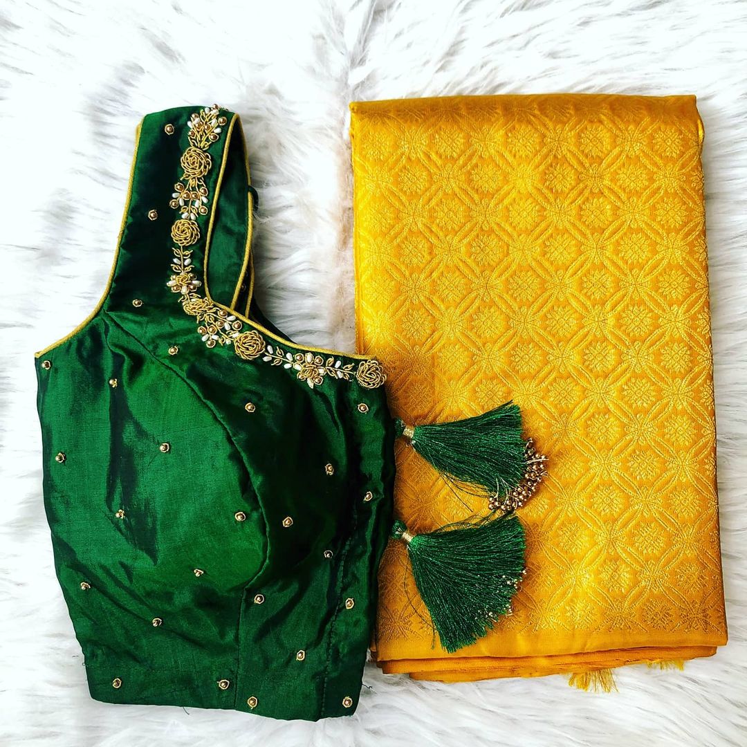 Trendy Yellow Saree With Green Blouse Designs